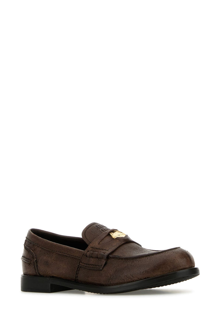 Brown leather loafers