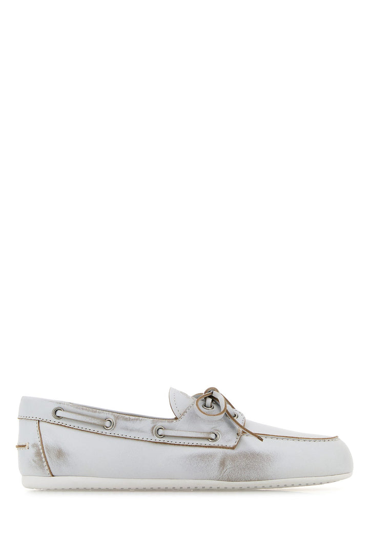 White leather loafers