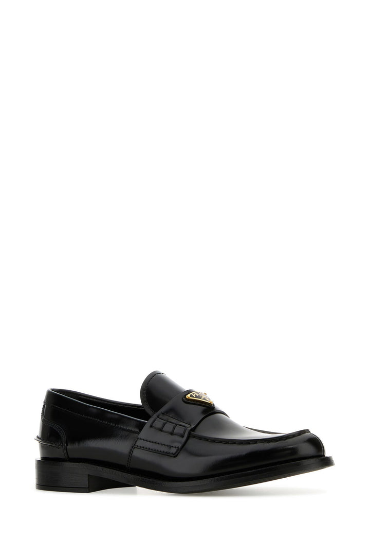 Black leather loafers