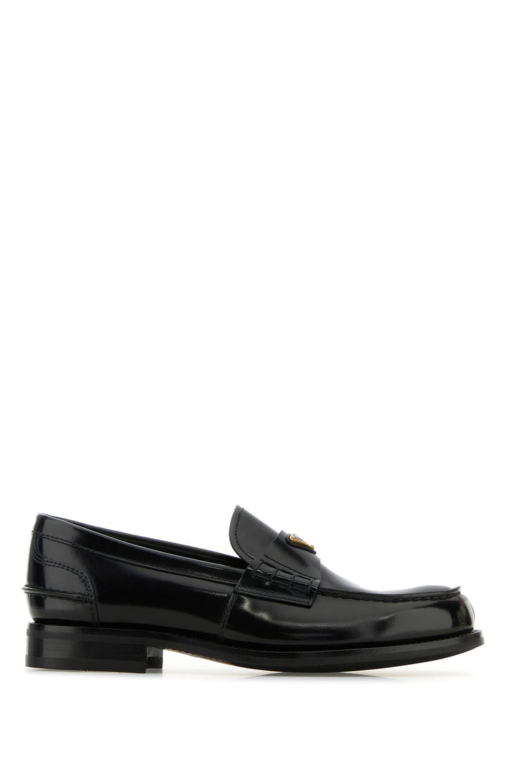 Black leather loafers