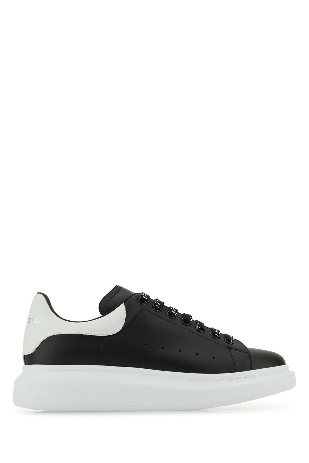 Black leather sneakers with white leather heel