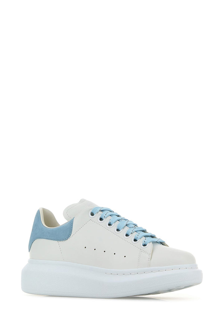 White leather sneakers with pastel light blue suede heel