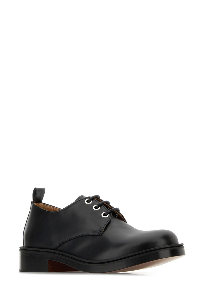 Black leather lace-up shoes