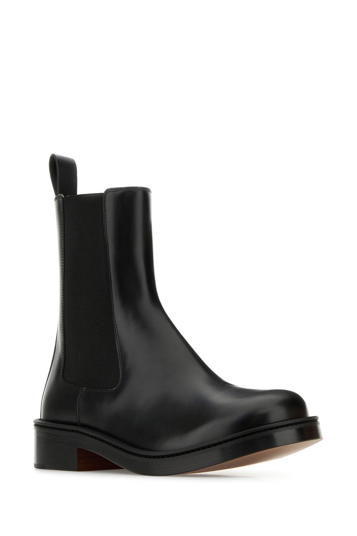 Black leather ankle boots