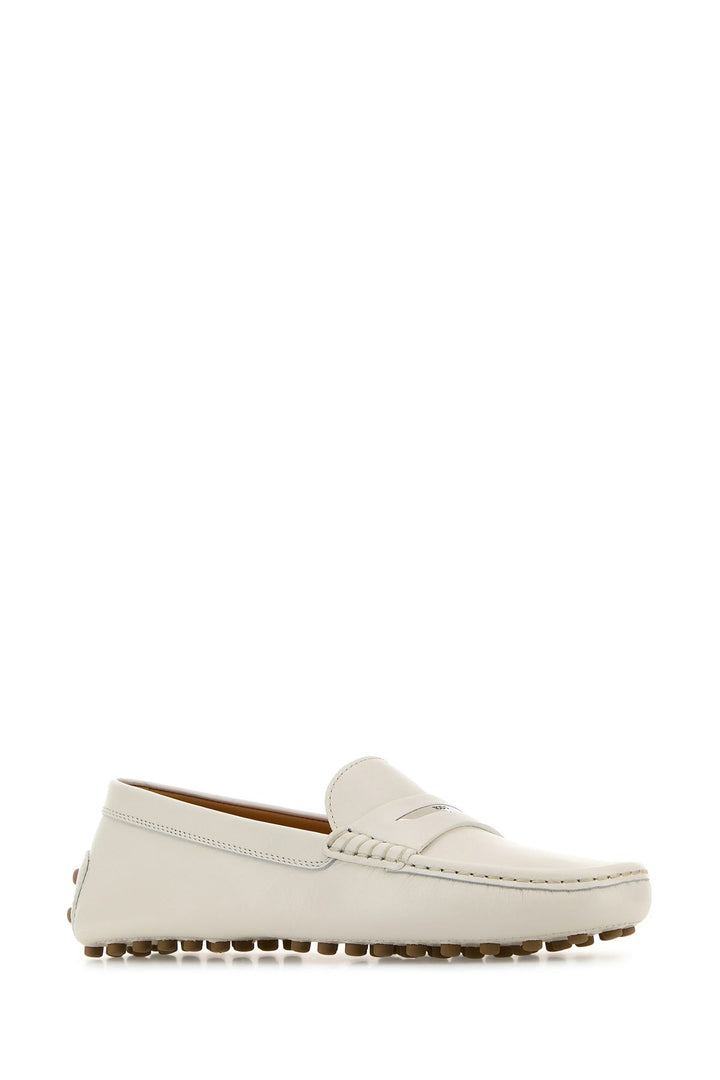 White leather loafers