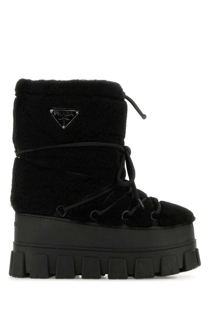 Black shearling ankle boots