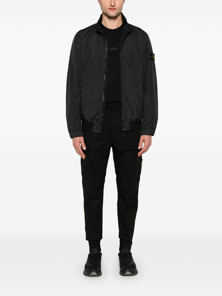 Stone Island Coats - BLACK | b07e0182d23291e56fd4462d9a26470053a1bd75