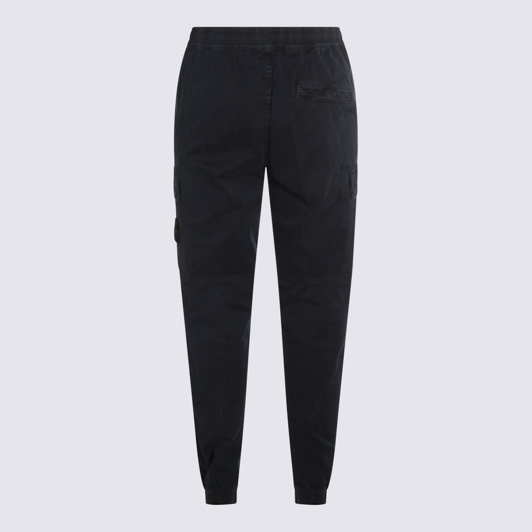 Stone Island Trousers - Blue and green | 7eb970be723abf65f1876c9d869dbad6581eecf6