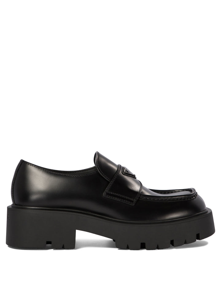 Prada Brushed Leather Loafers Loafers & Slippers - Black | 31f1526a32bc05656761035fcbddbd048d6f3e07