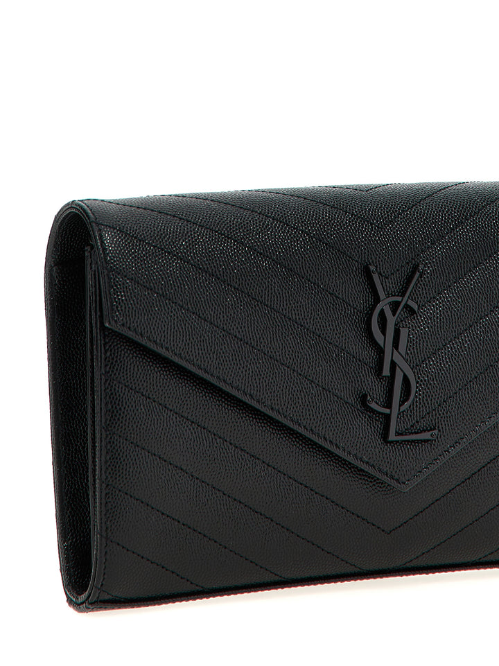Saint Laurent Cassandre Clutch - Black | a564948e06d1f3d9a28eda196f42229b7648b9b9