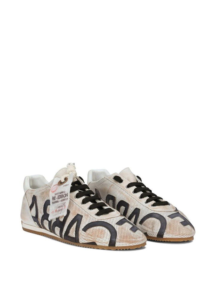 sneaker with all-over logo print