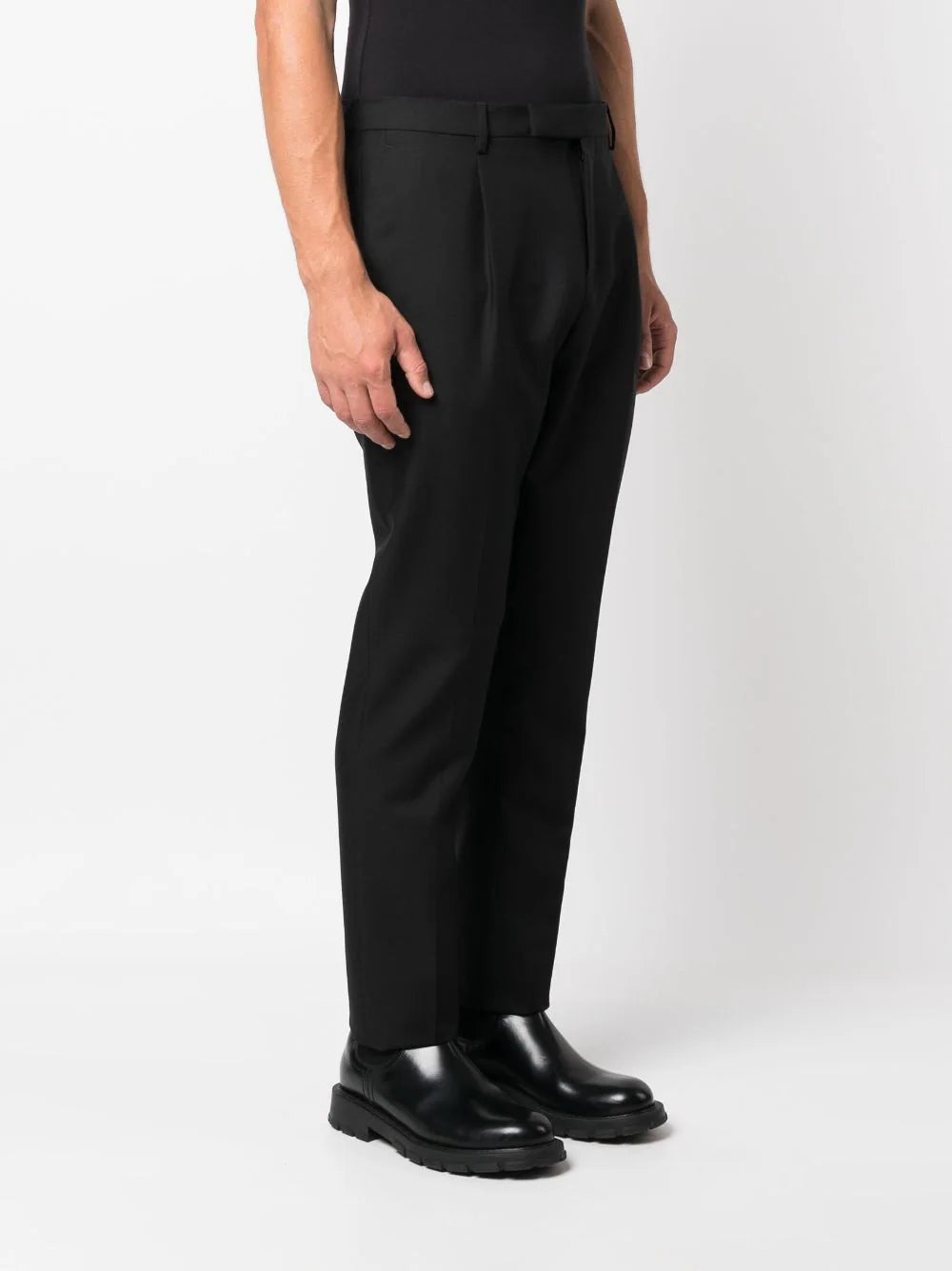 tapered leg trousers with ironed crease