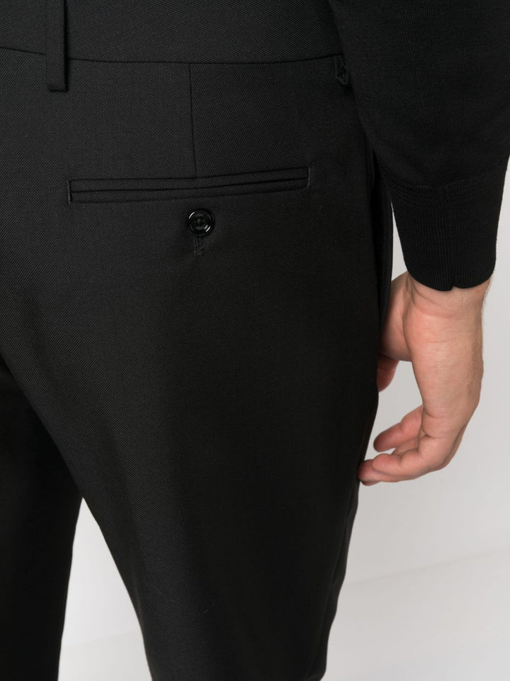 tapered leg trousers with ironed crease