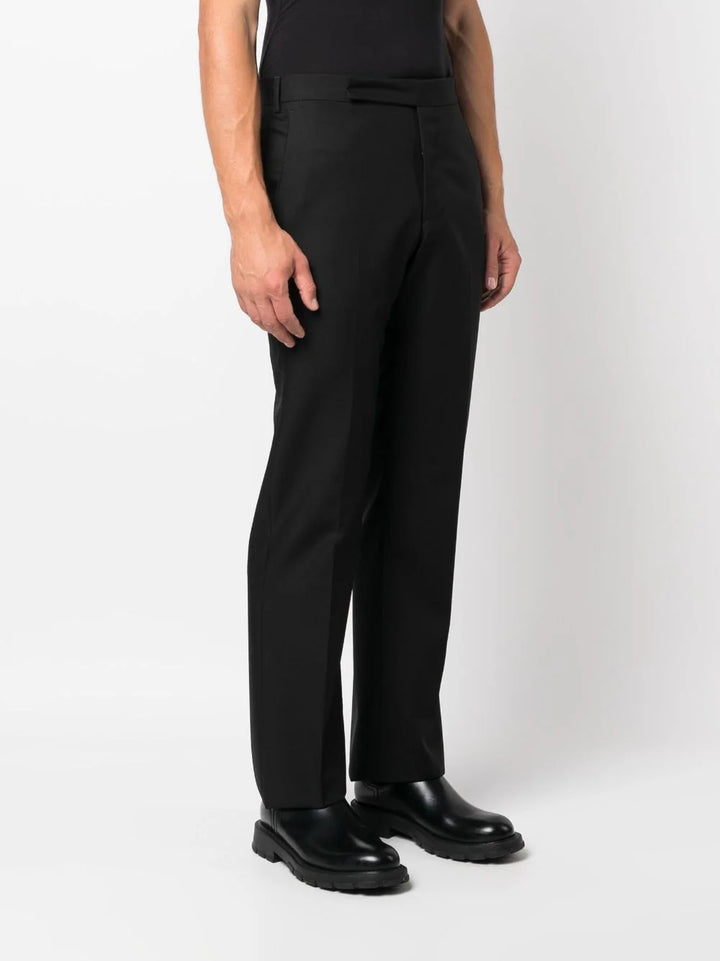 tapered leg trousers with ironed crease