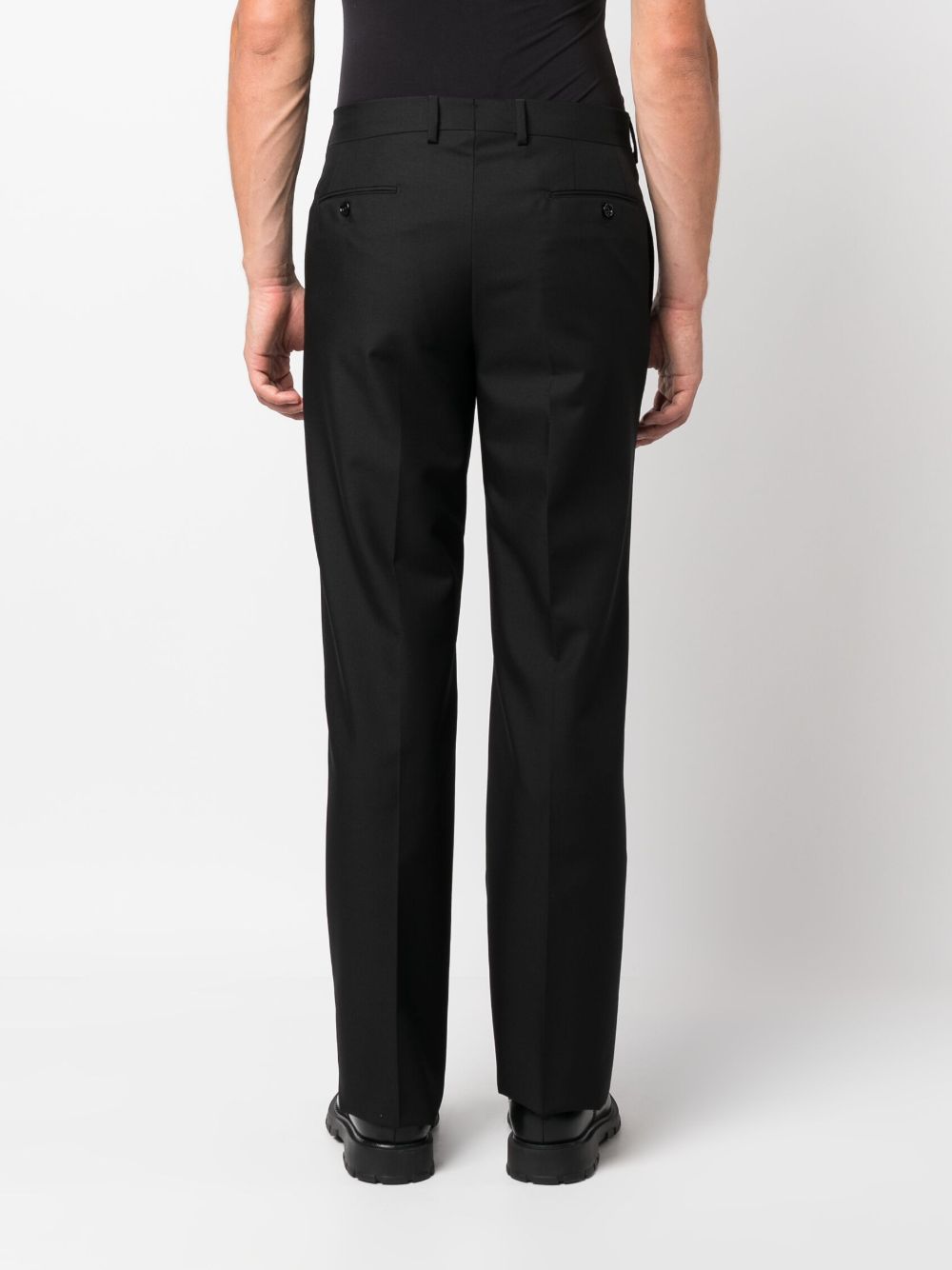 tapered leg trousers with ironed crease