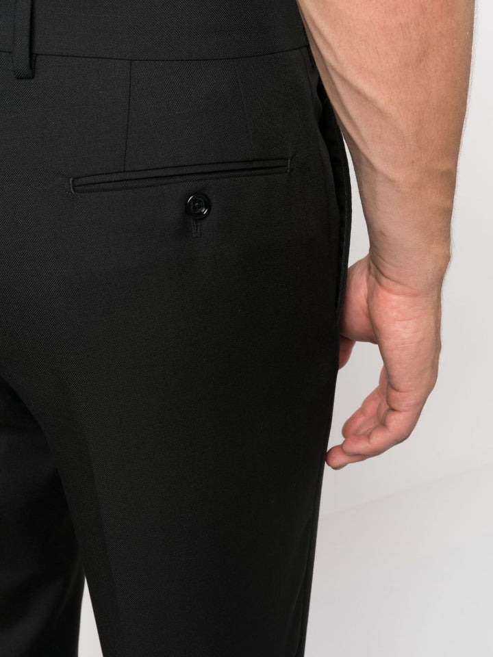 tapered leg trousers with ironed crease