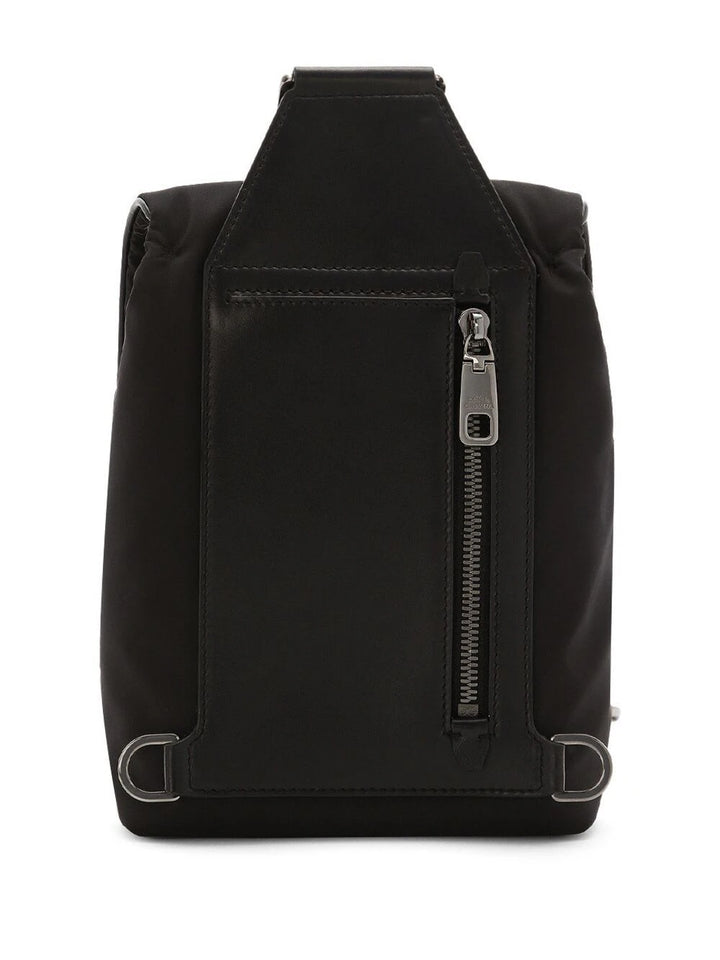 Backpack with logo plaque