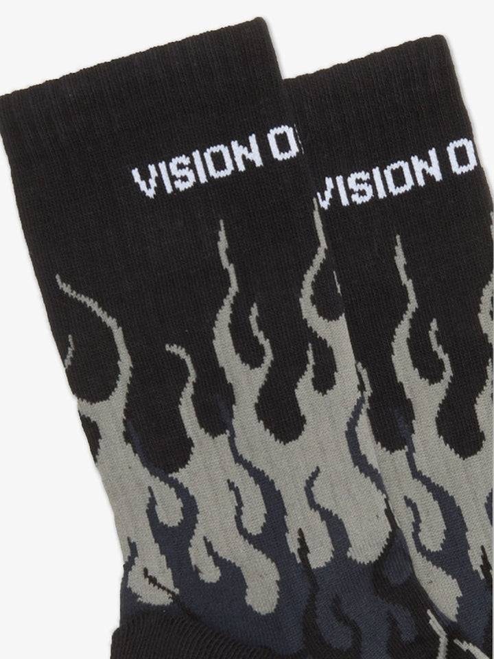 Black socks with grey flames and white logo