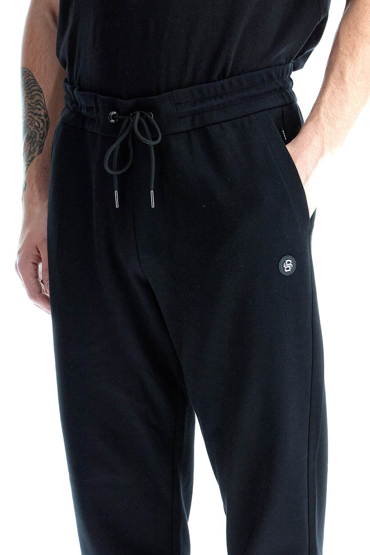 Pantaloni Jogger Con Patch Doppio Monogramma