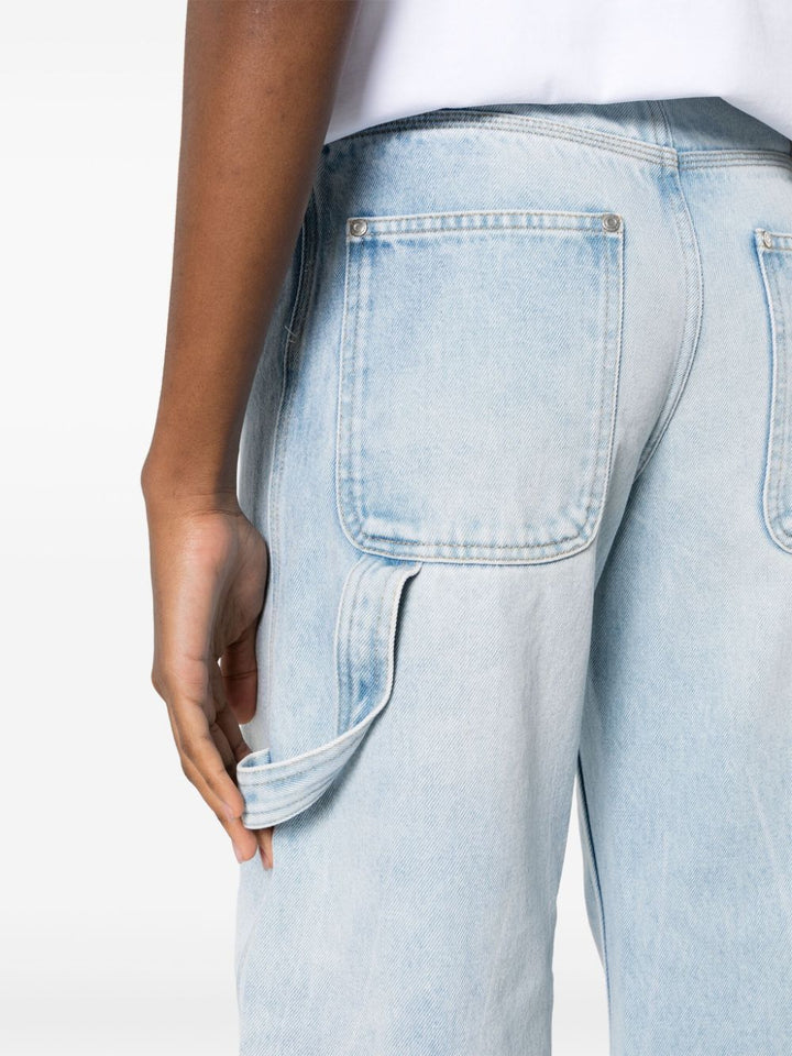 Mid-rise jeans with tapered leg