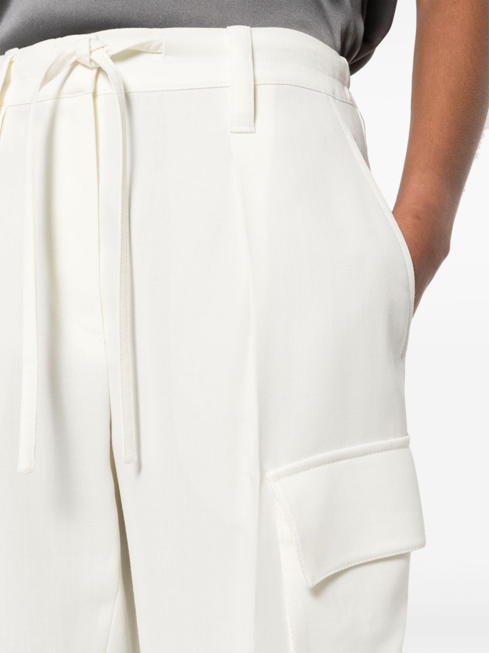 Trousers with monili details