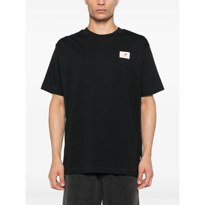 New Balance T Shirts - Black | 02b4542e0b89d8664559fe882663a52ce304e664