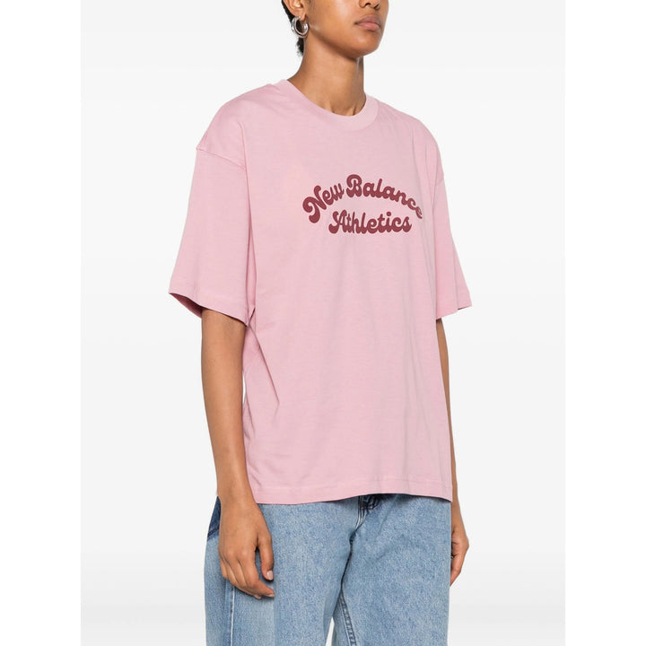 New Balance T Shirts - Pink | dd9cbbe3d6e047eb3f9518ba64f7a1957d3dd01a