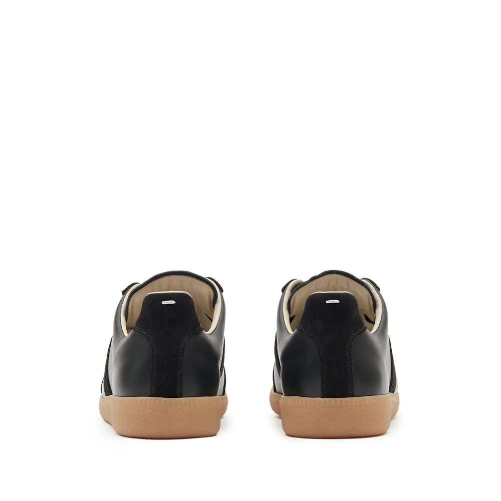 Maison Margiela Sneakers - Black | 7beac0d45807160319c2991fbd5b8f3a29569e31