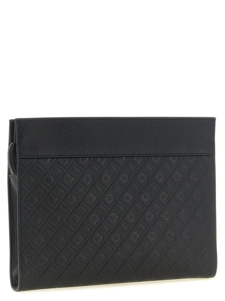 Ferragamo Ferragamo Monogram Clutch - Black | 14797b1c2a70a4896aa4c58068876696b1639cc5