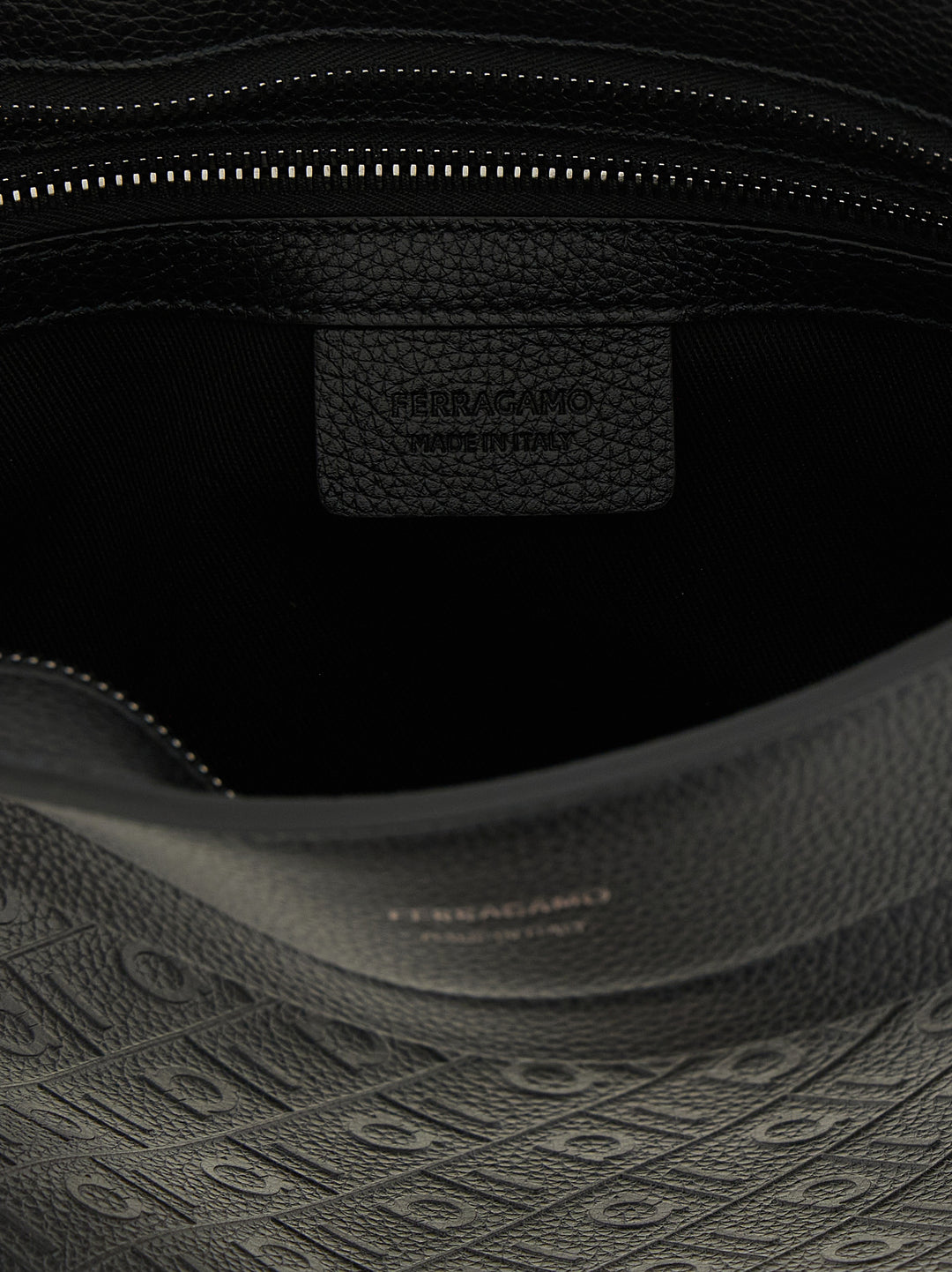 Ferragamo Ferragamo Monogram Clutch - Black | 499eda88d9f5763bca2055da4f64cc19915693a3