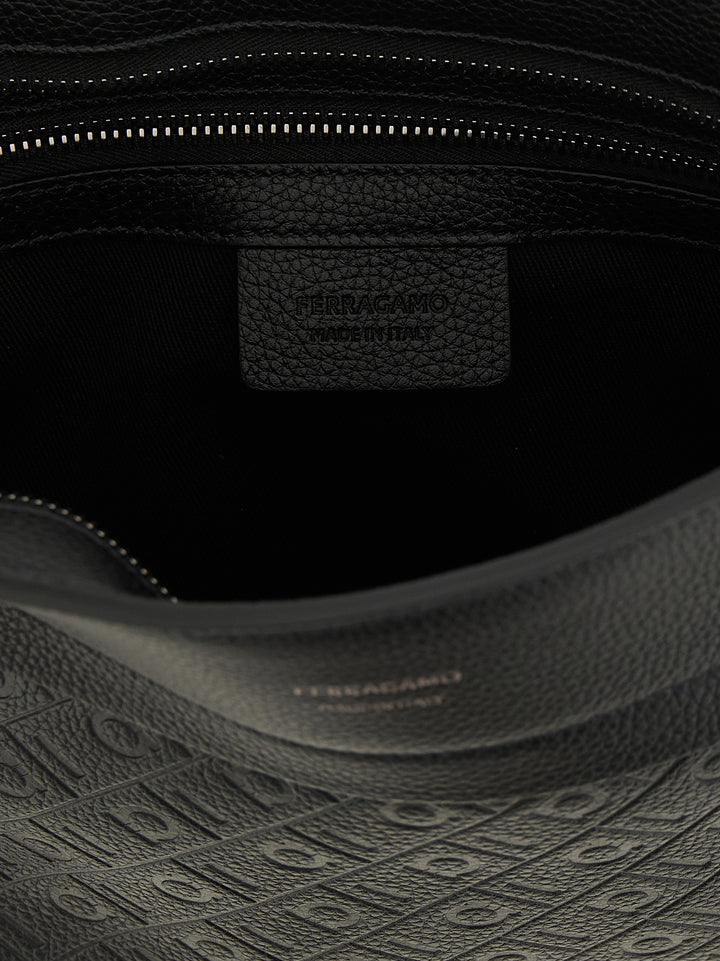Ferragamo Ferragamo Monogram Clutch - Black | 499eda88d9f5763bca2055da4f64cc19915693a3