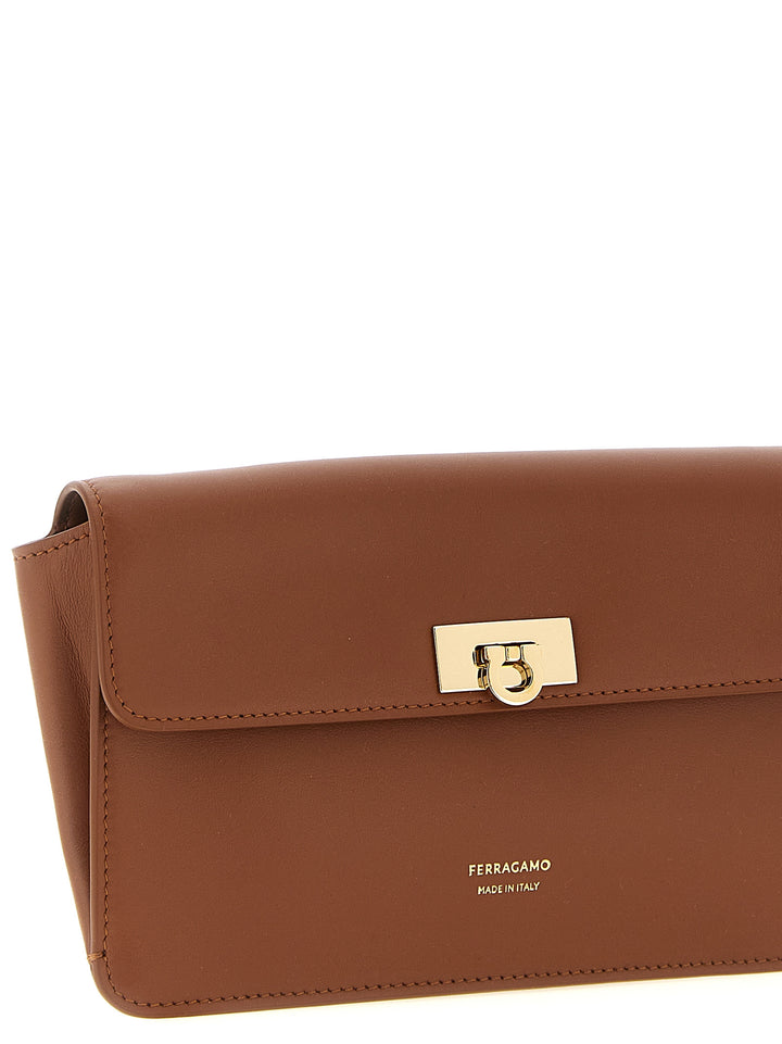 Ferragamo Harley Clutch - Brown | b1c8a89b4f5ff889fe80ae6f5cbb2a5389b30e0d