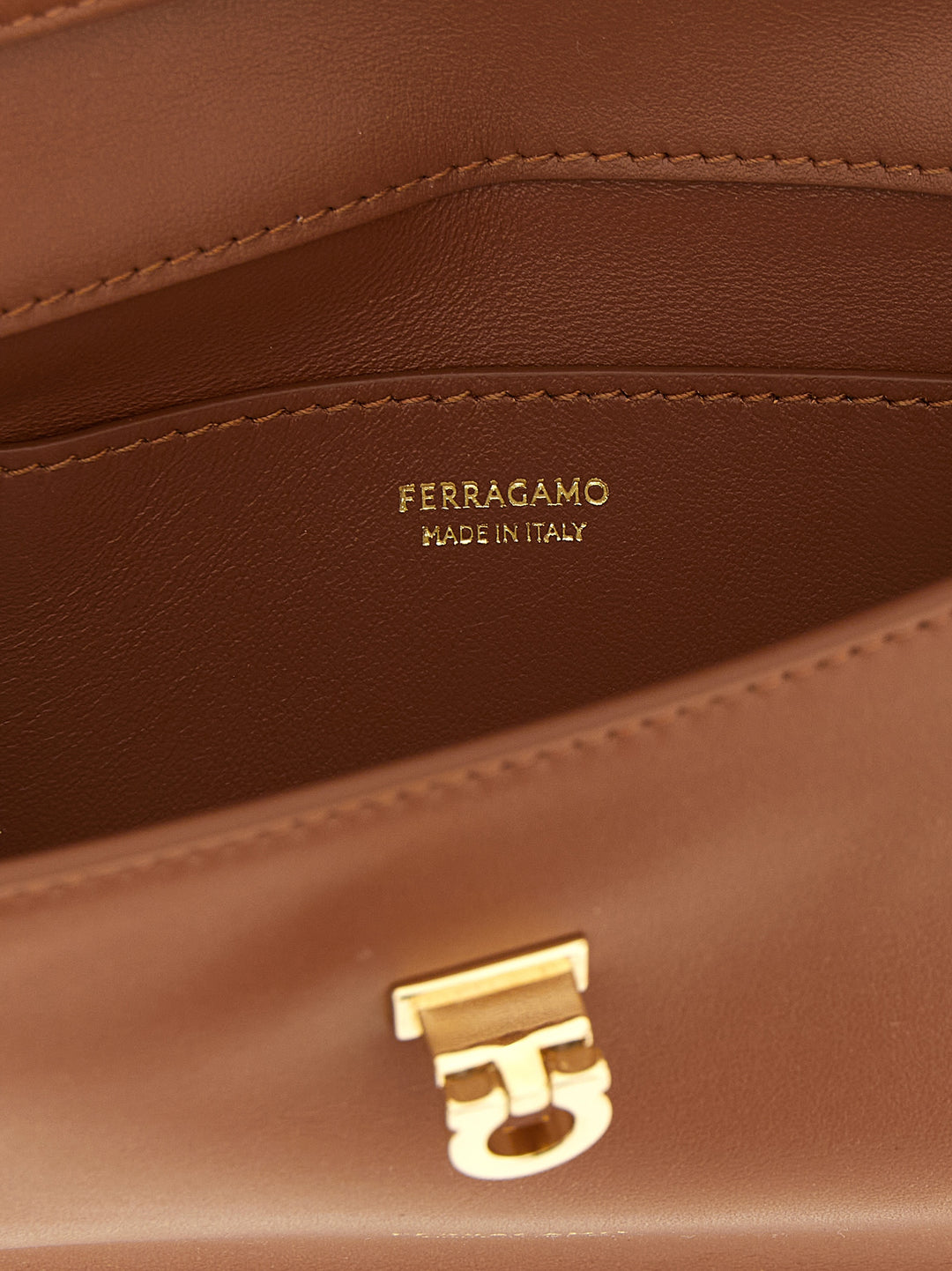 Ferragamo Harley Clutch - Brown | 0057ba68879474618c70efeedfdad640c3a4b92d