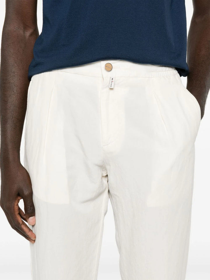 Tapered trousers with elasticated waist