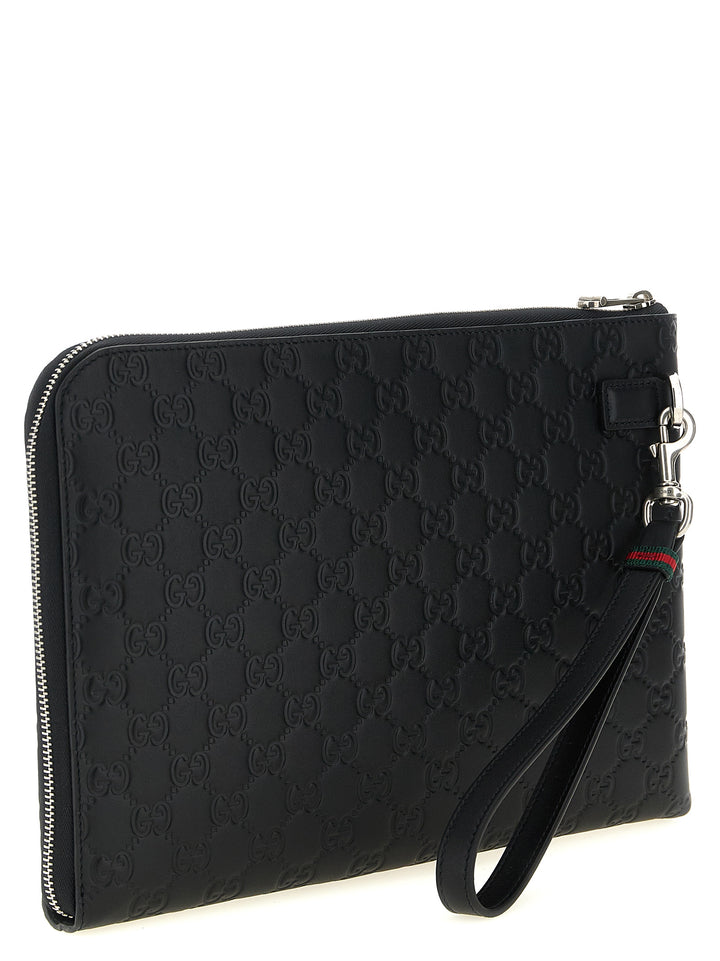 Gucci Gg Emblem Clutch - Black | 81830ca8952271cc41a1624ca1efb98f79cf83c6