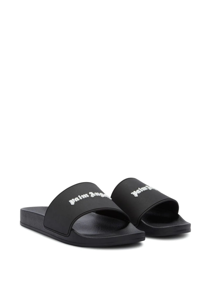 Slide sandals with embossed logo