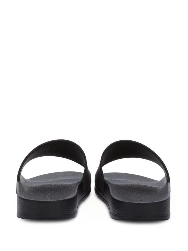 Slide sandals with embossed logo