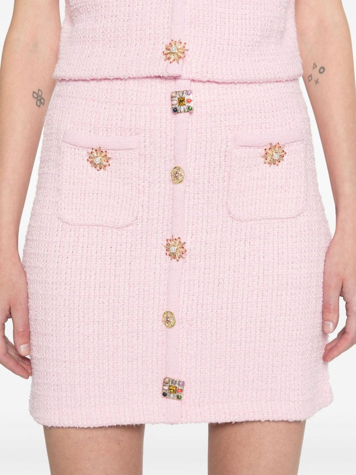 Miniskirt with jewel buttons