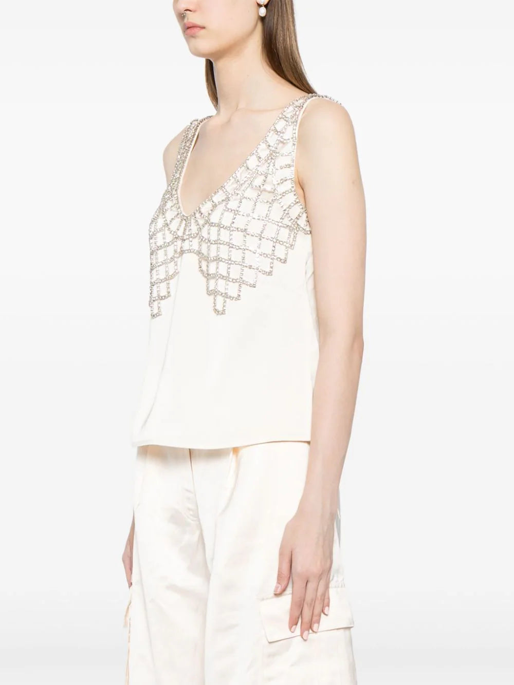 sleeveless blouse embellished with rhinestones