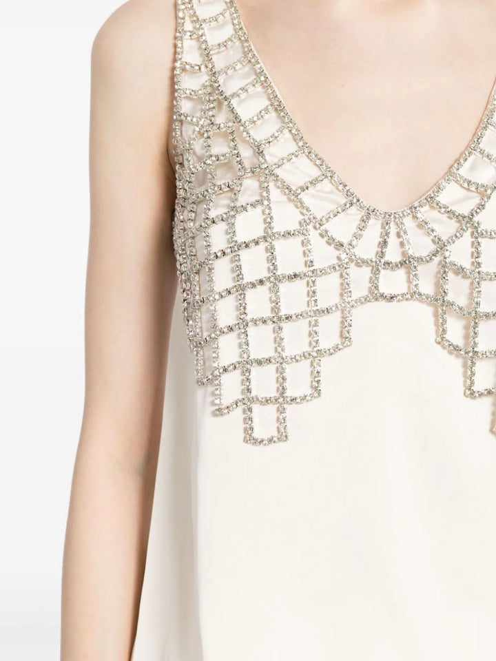 sleeveless blouse embellished with rhinestones