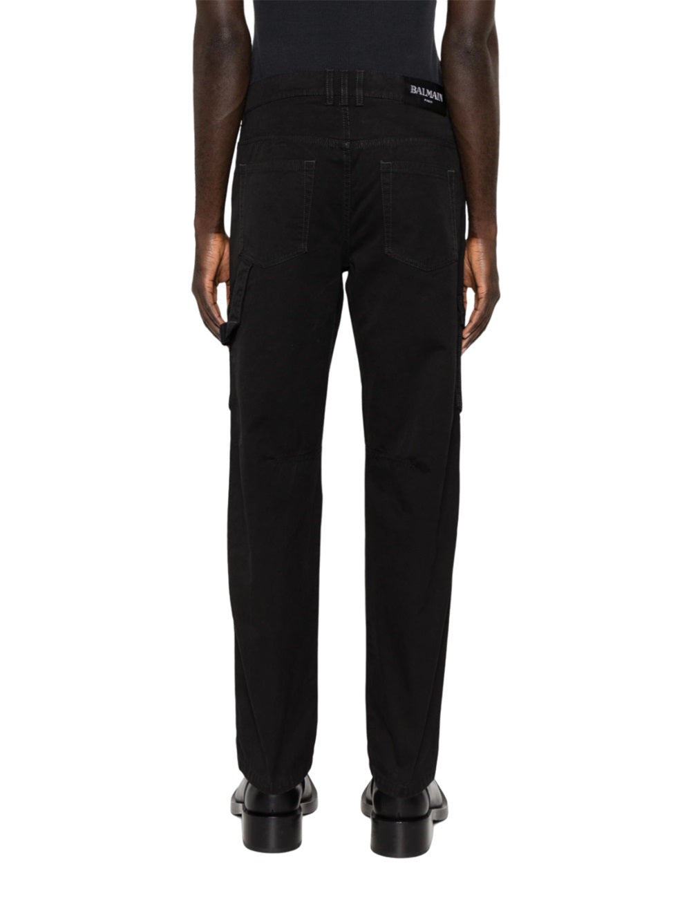 Tapered trousers with patch