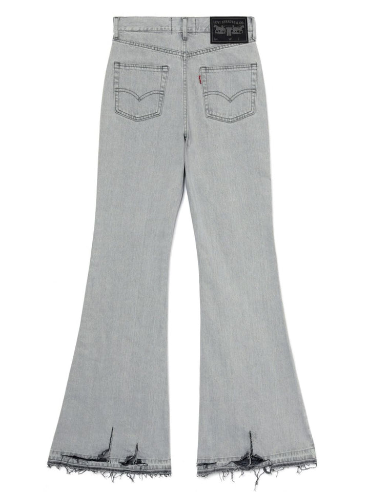 Flared jeans with a worn effect