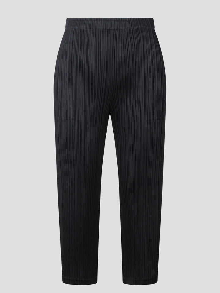 Pleated tight trousers