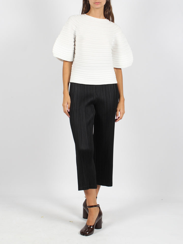 Pleated tight trousers