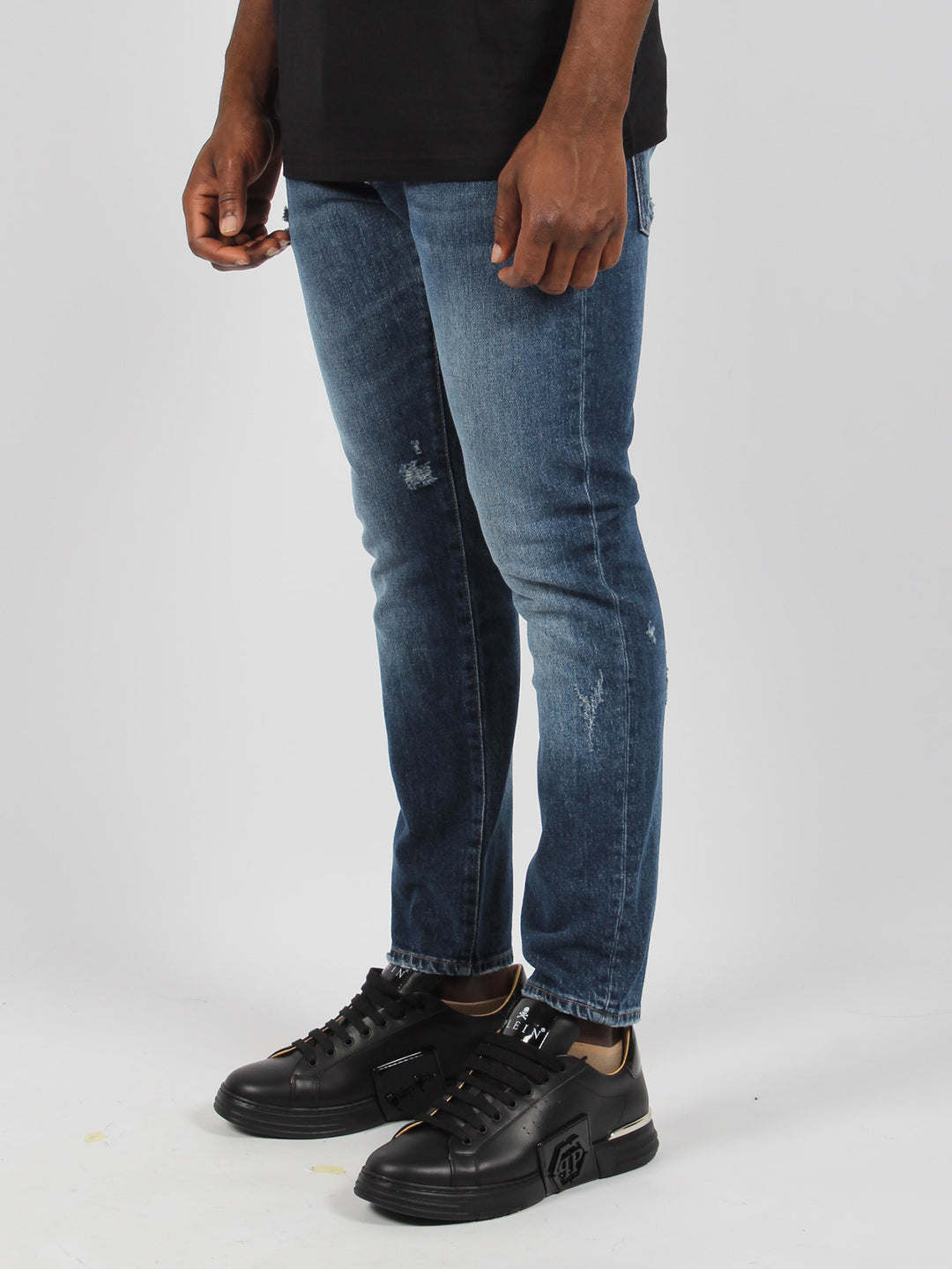 Skinny fit stone washed denim trousers