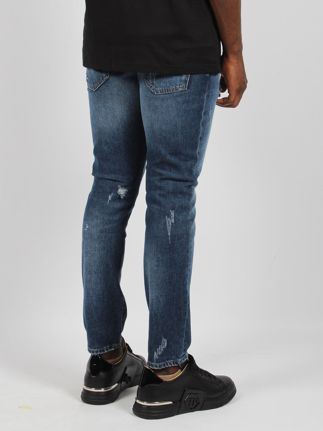 Skinny fit stone washed denim trousers