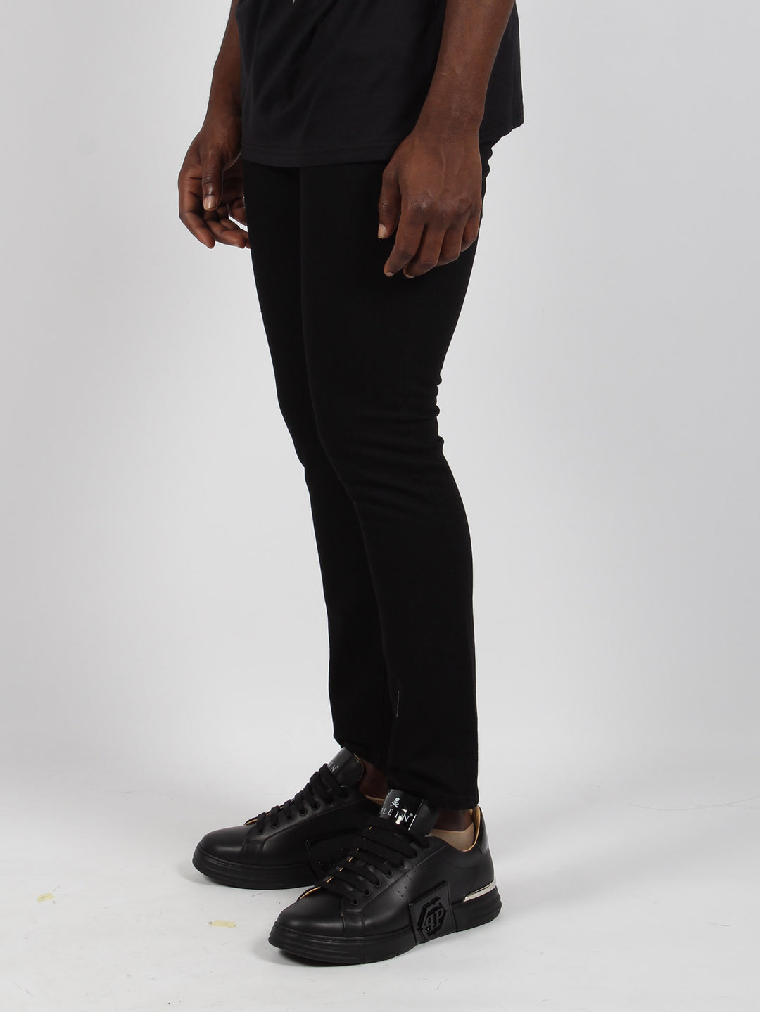 Skinny fit black denim trousers