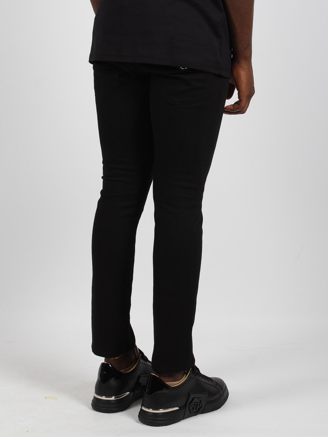 Skinny fit black denim trousers