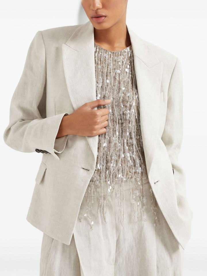 Blazer embellished with jewellery