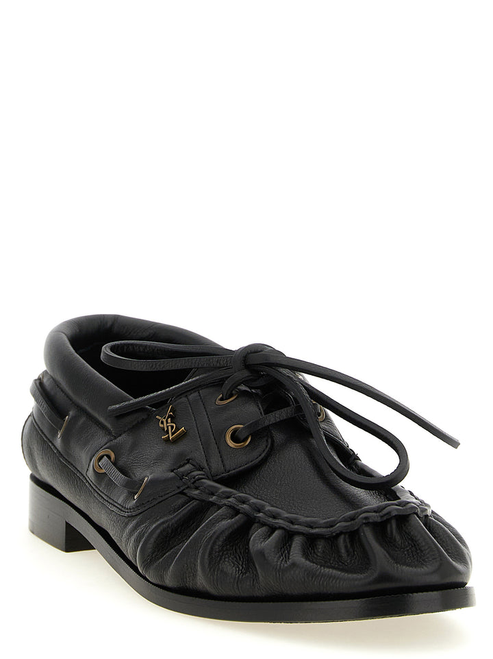 Saint Laurent Le Loafer Bateau Loafers - Black | f3212a9847d4f00ef3fe3e7382ac75785df6fb3c